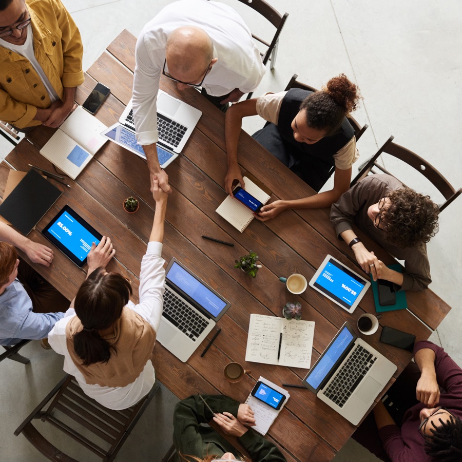 The Grit Marketing Solutions team reviewing client growth data together